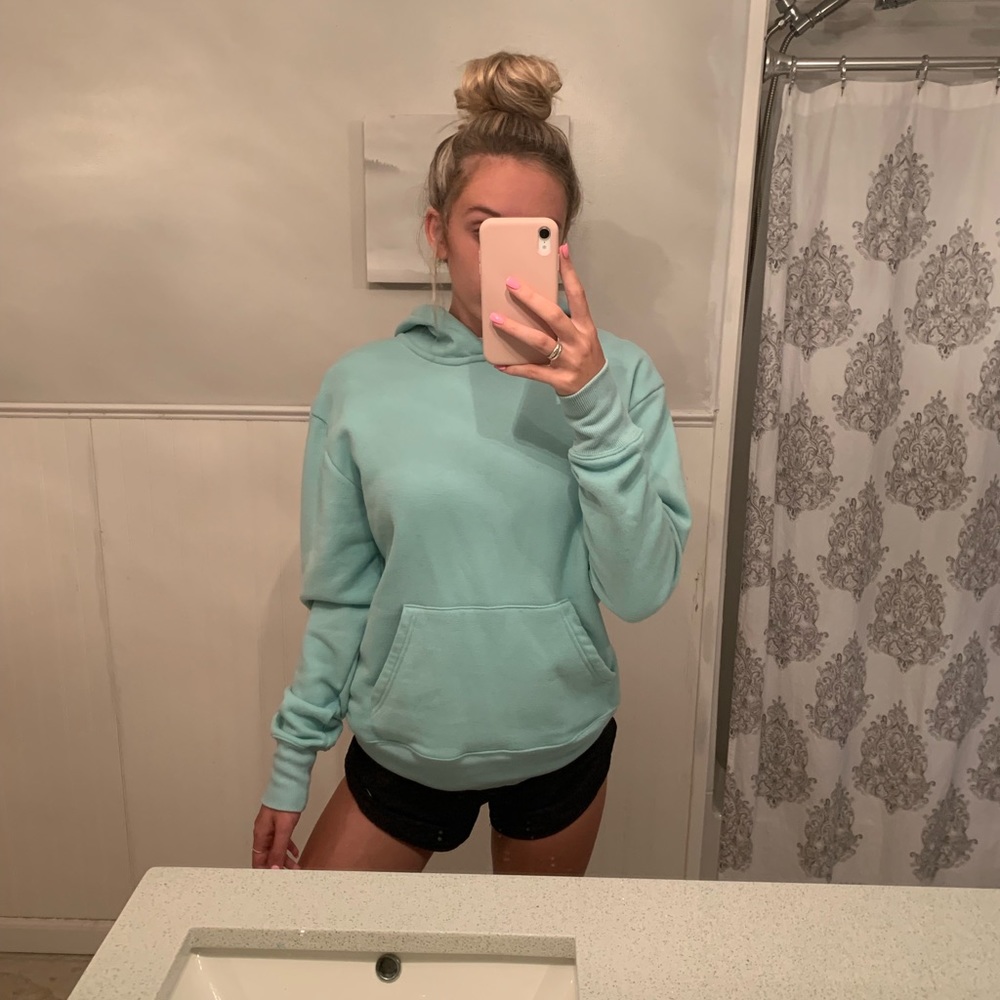 light blue sweatshirt